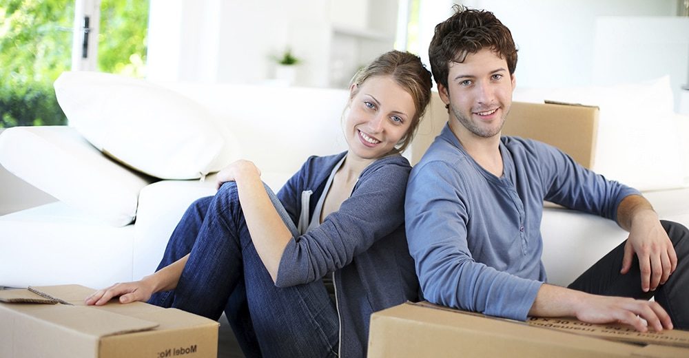 Young couple moving in their home